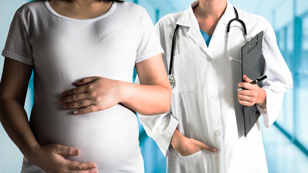 Bauch schwangere Frau mit Ärztin